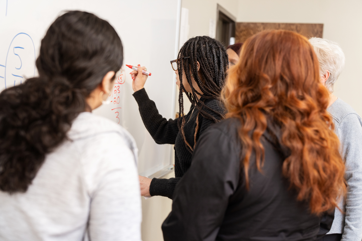 students at whiteboard