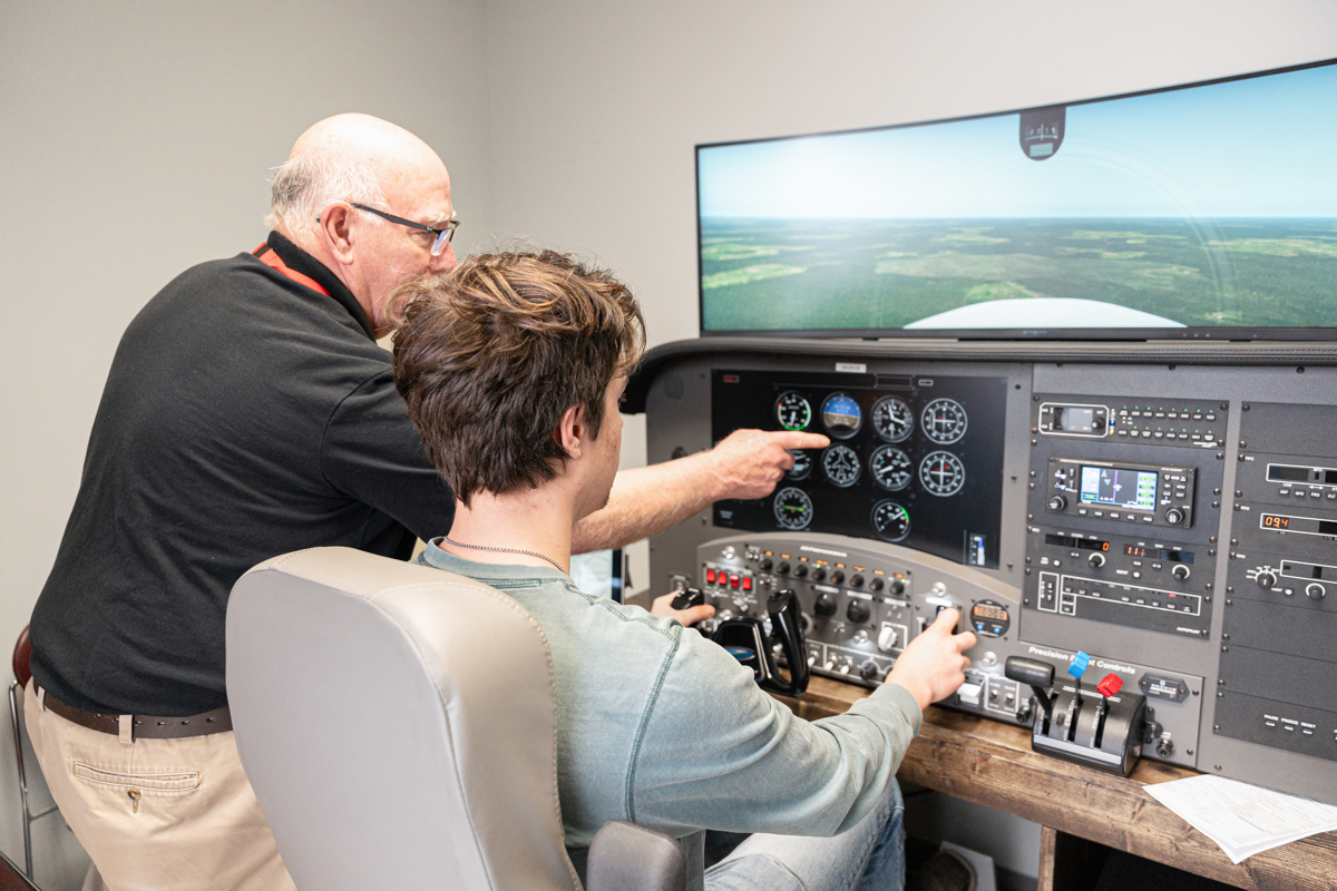student and instructor using test equipment