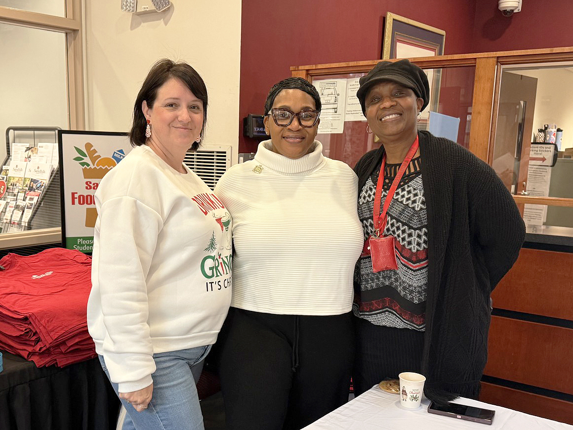 Three SCC Faculty & Staff Members standing for a photo