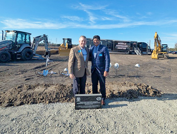 SCC President Dr. Sandy Stewart (left) stands with PTT President Sandeep Chakravarty at the December 10, 2025 groundbreaking of a new Hoke County facility in Hoke County.