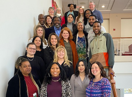 Shenika Ward, Dean of Engagement, stands with a newly formed group of campus-wide Access Advocates