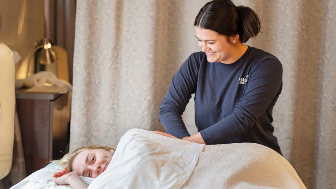 Pictured is a massage therapy student working. 