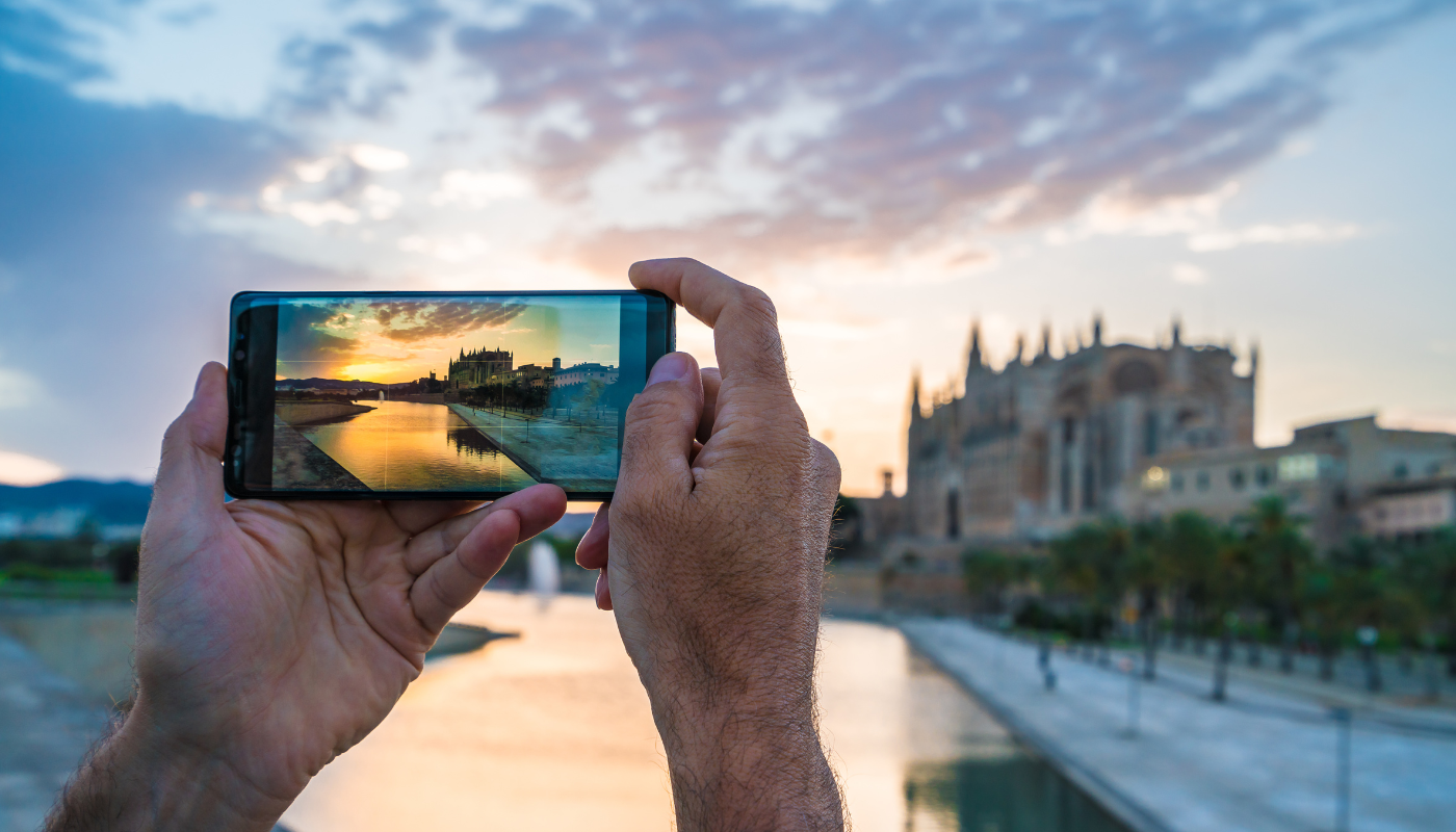 Pictured is someone taking a photo of the camera with their iPhone.  